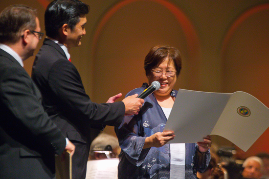 Parrish, Kosasa, and Honolulu City Managing Director Ember Shinn, reading a Mayoral Proclamation in honor of the 50th Anniversary of the opening of the Neal Blaisdell Concert HallPhoto credit: Brad Goda Photography