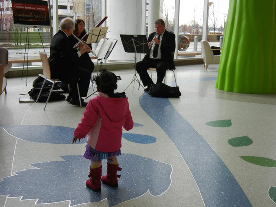 Randall Hester, flute, Robert Royse, oboe, and Betsy Sturdevant, bassoon, performing at Nationwide Children’s Hospital Photo credit: Linda Oper