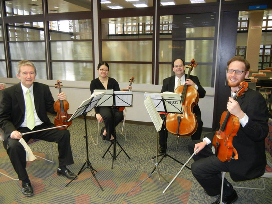 David Niwa and Alicia Hui, violins, Karl Pedersen, viola, Luis Biava, cello, at Chemical Abstracts Service cafe Photo credit: Linda Oper