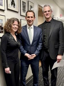 San Francisco Mayor Daniel Lurie (center) poses for a photo with violinist Melissa Kleinbart and bassist Scott Pingle